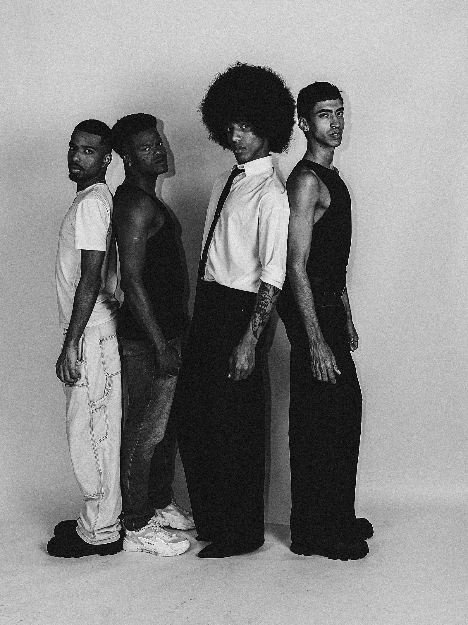 Models lined up against a white backdrop