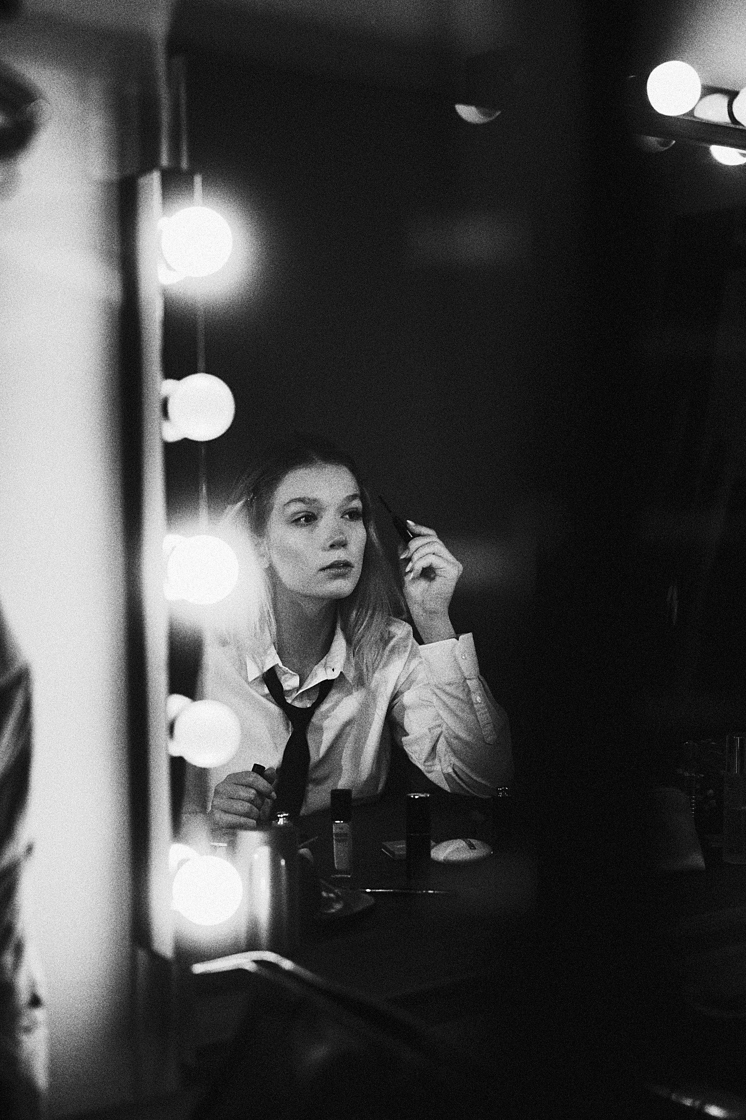A model preparing at the mirror